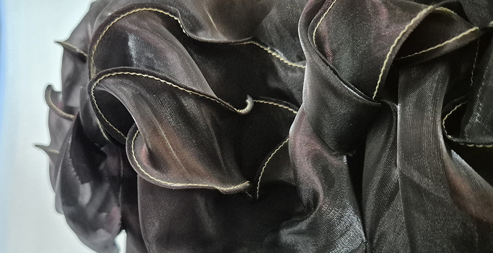 Close up of Adele Frank's signature Crumpled Sewing Application Technique.