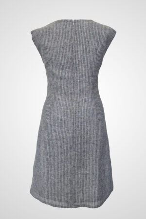 Back view of the Luna Alba empire waist dress with minimal dropped shoulders and fluid silhouette.