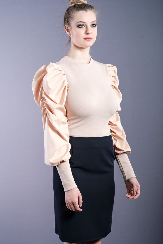 Apricot shirt with puffed sleeves and power shoulders