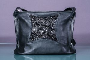 Glittering effect silver dotted small leather bag