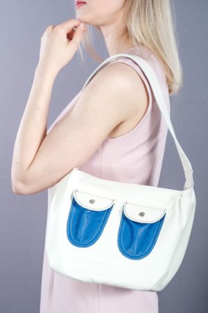 Boat shape buttercream colored leather tote bag