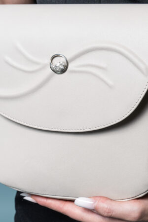 Adele Frank Serenitas beige cream leather saddle bag.