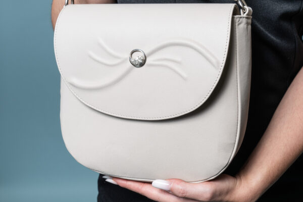 Adele Frank Serenitas beige cream leather saddle bag.
