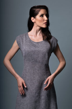 Luna Alba Empire Dress styled in a poetic, minimalist setting, evoking timeless elegance and quiet luminosity.