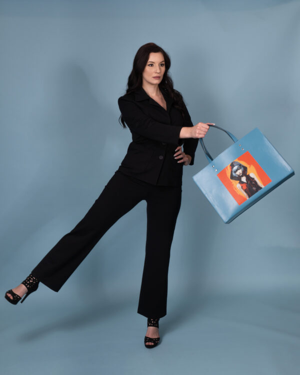 Styled shot of the Urban Siren bag showcasing it's unique design.