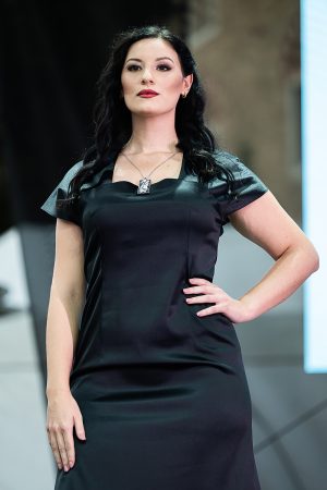 Model wearing the Adele Frank Pliora Nr°08 medal at Porcelain Doll Fashion Show.