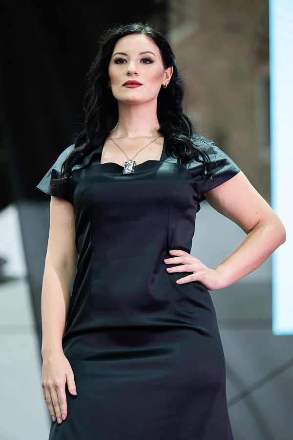 Model wearing the Adele Frank Pliora Nr°08 medal at Porcelain Doll Fashion Show.
