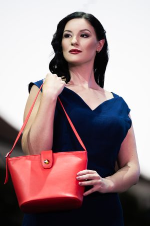 Model carrying the leather Adele Frank Ardor bag at Porcelain Doll Fashion Show.