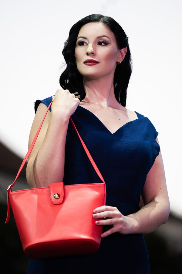 Model carrying the leather Adele Frank Ardor bag at Porcelain Doll Fashion Show.