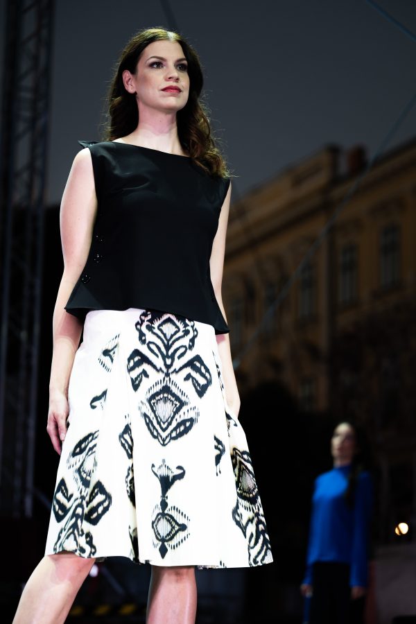 Model wearing the Alba Scriptum abstract patterned skirt