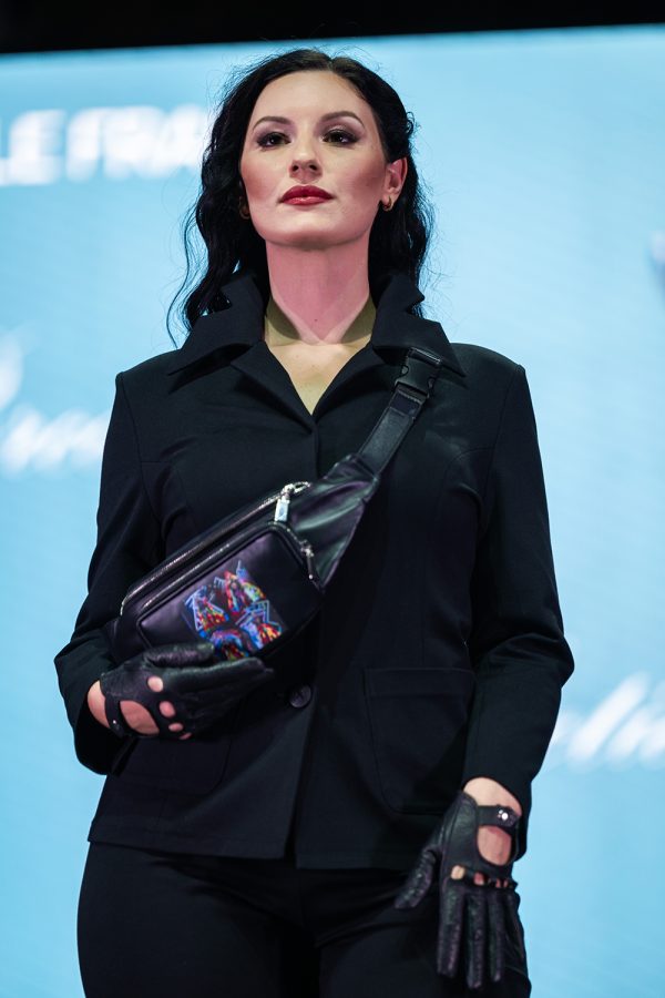 Model carrying Fantasy Paraphrase leather Adele Frank bag at Porcelain Doll Fashion Show.