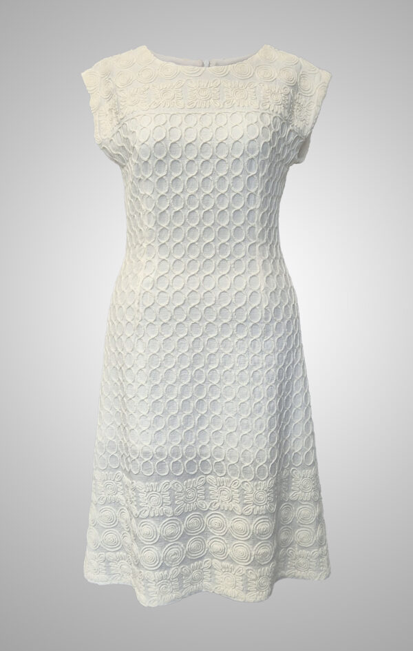 Ecru Velum Antiquum textured dress dress with sculptural threadwork from the front.